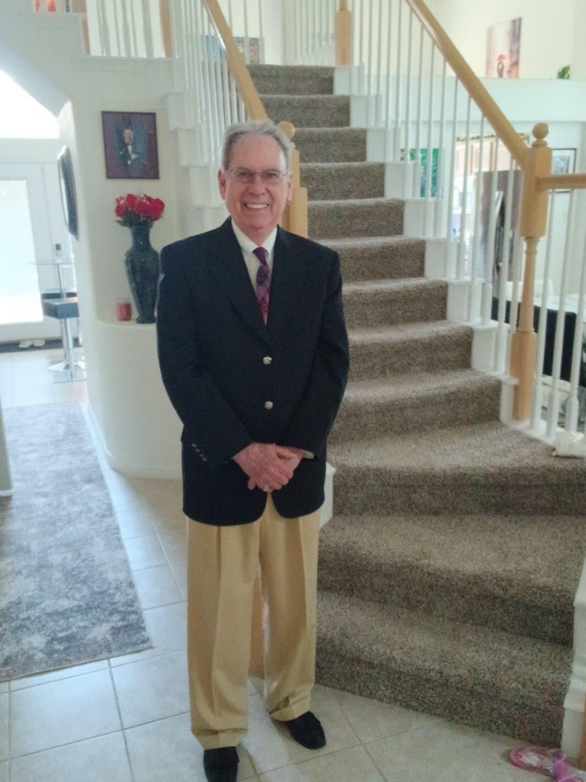Step Jones in front of an American flag display